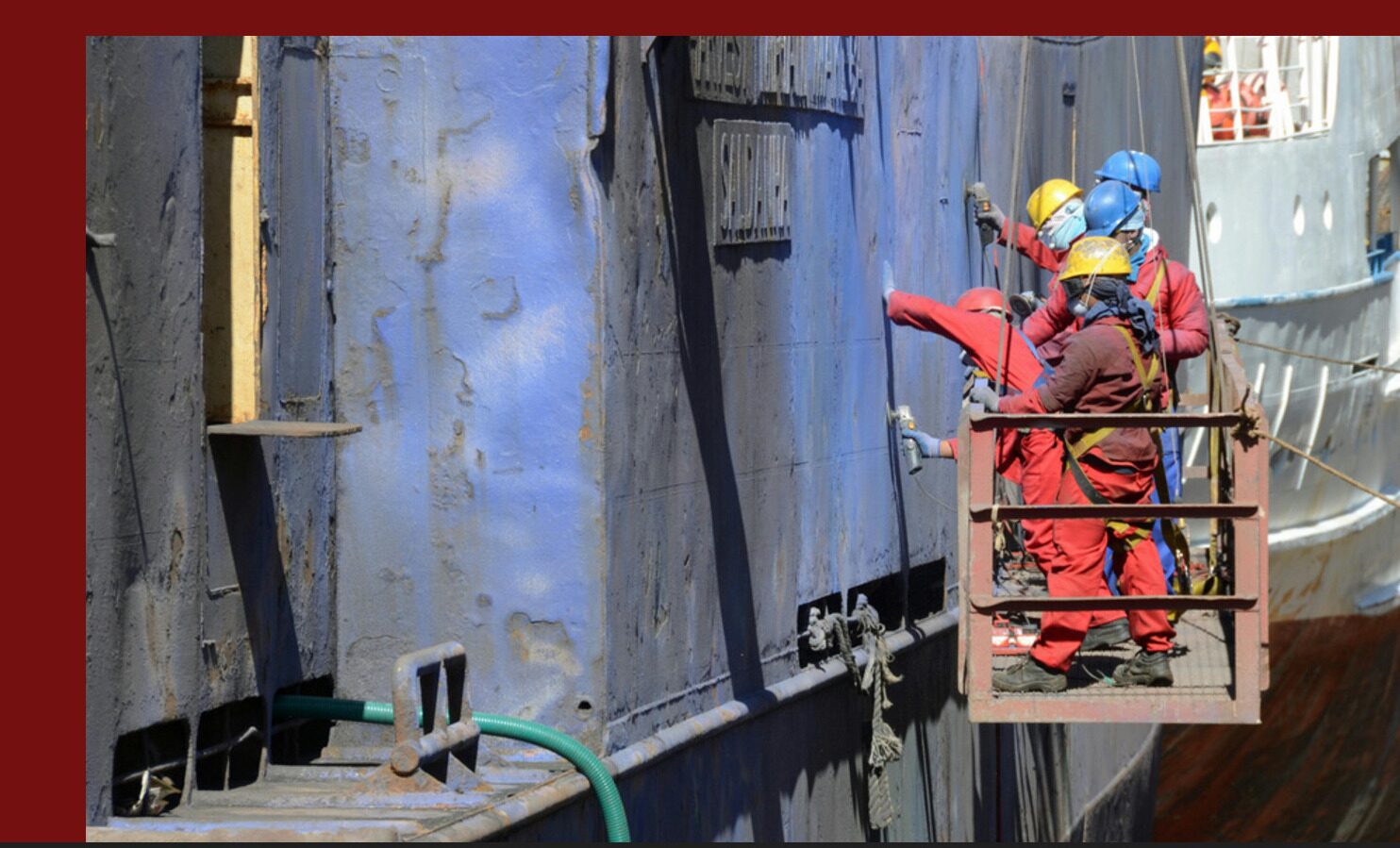 Red Falcon Marine technicians performing hull maintenance